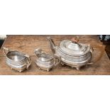 A 20th century silver three piece tea set service, Birmingham 1946, G Bryan & Co weight 35.