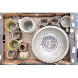 A collection of studio ceramics including stoneware, mugs, vases,