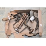 A collection of four vintage tools,