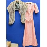 A salmon pink taffeta dress 1940s, with short sleeves, could have been a bridesmaids dress,