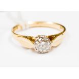 A diamond solitaire 18ct yellow gold ring. with claw set diamond, weighing approximately 0.