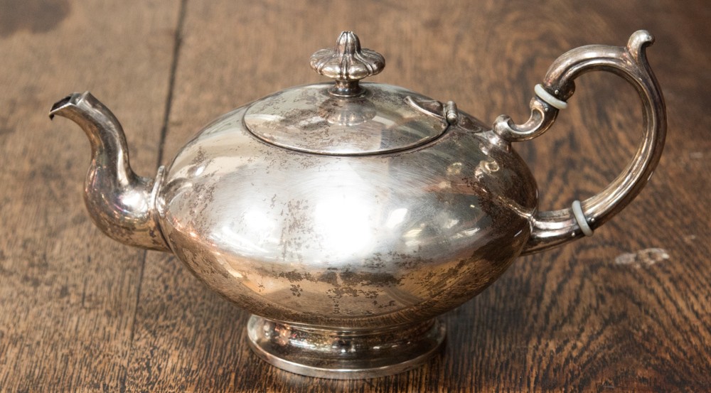 A 19th century German silver tea pot stamped Schelhaas 0.