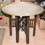 An Anglo Indian folding brass table