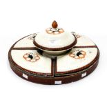 A Wedgwood Queensware chafing dish set, the wedge shaped lidded dishes surrounding a pedestal bowl,