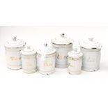 A set of six early 20th Century enamelled French kitchen jars,