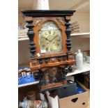 A Victorian mahogany and ebonised Art Nouveau wall clock, brass dial, Roman numerals,