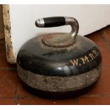 A curling stone, Scottish granite with chromed handle,