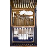 An oak canteen of Mappin and Webb EPNS cutlery,