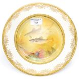 A Minton cabinet plate, painted with fish by J.E.