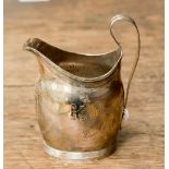 A George III silver cream jug, weighing approx 3.