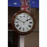 A 19th Century mahogany wall clock, having a white enamelled dial, black Roman numerals,