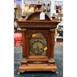 An oak bracket clock of Baroque design