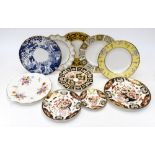 A collection of ten Royal Crown Derby plates dinner and tea different patterns