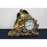 A contemporary quartz bronzed mantle clock, William Widdop, dial having Roman numerals,