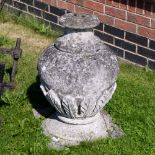 A limestone finial, acanthus moulded, ovoid form, relief carved,
