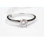 A diamond claw set solitaire ring set in 18ct white gold, the round brilliant cut diamond approx 0.