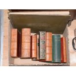 A small collection of decorative bindings, some leather, some cloth,