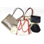 A collection of women's handbags, including Longchamps leather, Viyella,