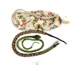 Two beadwork toy snakes; together with a beaded drawstring bag,