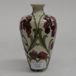 A Moorcroft vase in the blue geranium pattern, 1st quality, in unusual colourway,