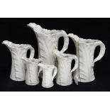 A set of six Royal Worcester leaf moulded jugs, ivory finish,