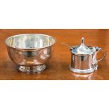 A silver mustard pot with blue glass insert and EP spoon, Birmingham hallmarked 1947, weight 2.