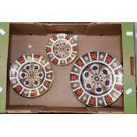 A set of 18 Royal Crown Derby Imari 1128 plates, including dinner, tea and side plates, six of each,