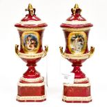 A pair of mid 19th century German urn vases and covers,