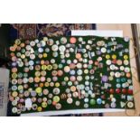 Badges presented on a felt display hanging sheet,