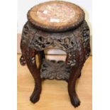 A Chinese hardwood and marble inset stool or jardiniere stand
