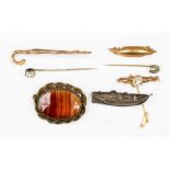 A collection of brooches and pins comprising a 9ct Rose gold walking cane brooch,