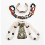 An Egyptian and Eastern silver jewellery including necklaces and bangle