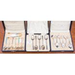 A boxed set of five silver and enamelled teaspoons, Birmingham 1929,