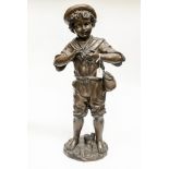 A 20th Century bronze figure of a peasant boy