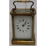 A gilt brass carriage timepiece, white dial,