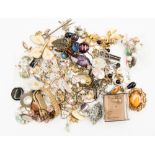 A bag of costume jewellery, including rolled gold bracelet, Mille Fleur paperweight, cufflinks,