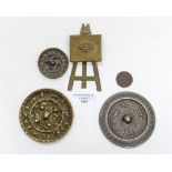 A Victorian novelty brass needle case in the form of an easel and folder,