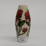 A Moorcroft vase in the Trefoil pattern, 1st quality, in unusual colourway,