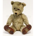 Teddy Bear: A 20th century mohair teddy bear, orange glass eyes,