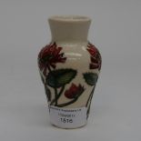 A Moorcroft 1st quality vase in the trefoil pattern, in unusual colourway,