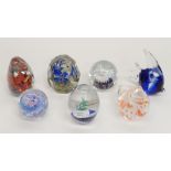 Seven assorted glass paperweights to include a Caithness Chicken (7)