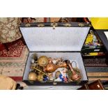 A school boys trunk containing an ecclesiastical collection of brass and copper bowls,