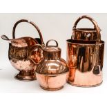 A copper footed coal scuttle with two copper straight sided buckets,