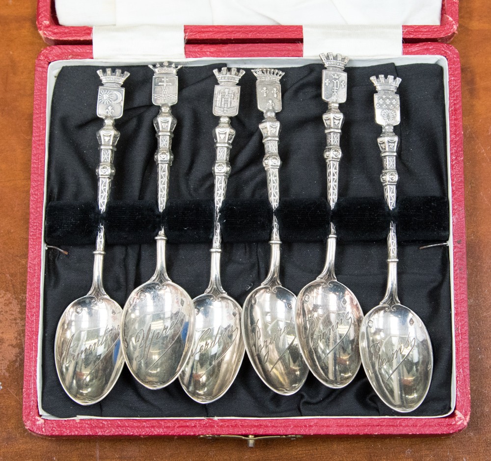 A boxed set of six French silver souvenir teaspoons with the arms of the battles of World War One
