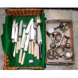 A silver thimble and a basket of cutlery and silver plate including a castor etc