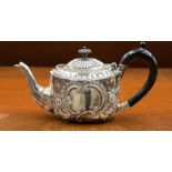 Silver tea pot with scroll and foliate design, hallmark London 1897, indistinct makers mark,