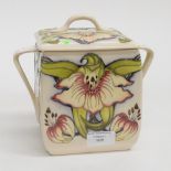 A Moorcroft square twin handled biscuit box and cover, 1st quality,