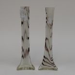 A pair of mauve and cream triangular glass vases, approx 29.