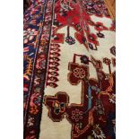 A quality 50" x 80" hand woven rug,