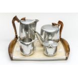 A Picquot Ware five piece tea set including tray